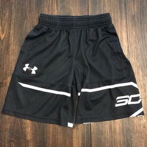 Under Armour shorts Black with white striping.